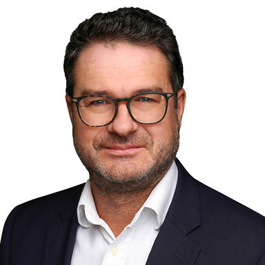 Headshot of Justin  Thomson