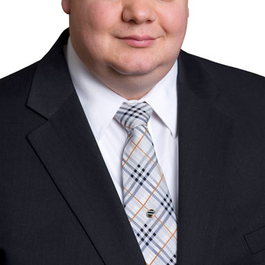 Headshot of James  Tzitzouris