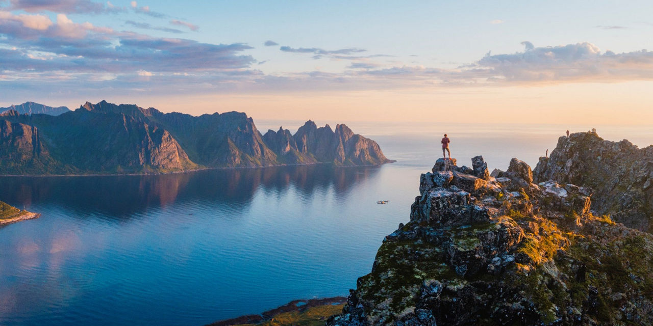 hiker at the top of the mountains