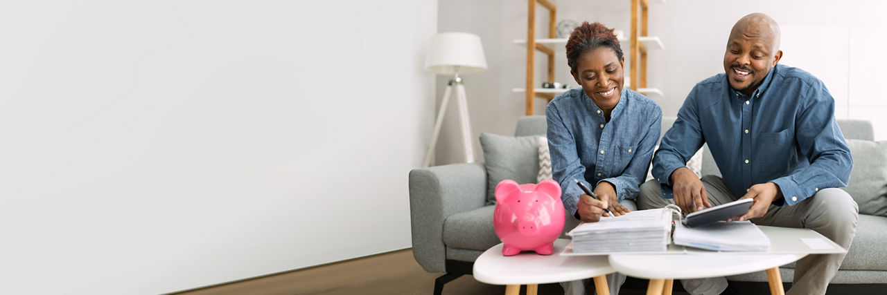 Happy African Couple Doing Retire Finances Plan And Money Budget