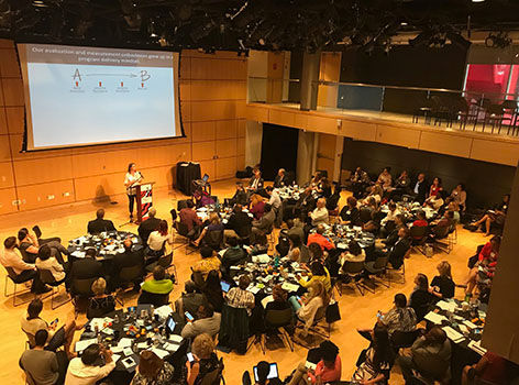 Overhead shot of the foundations program workshop offerings looking over a full room.